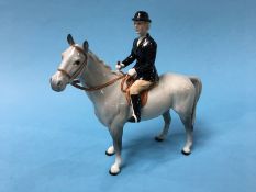 A Beswick 'Huntswoman' on horseback, gloss grey, number 1730, circular Beswick mark