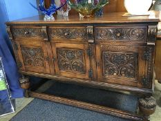 A carved oak sideboard