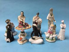 A collection of nine various Russian figures