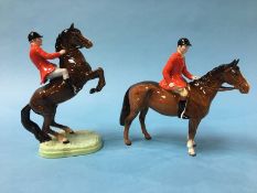 A Beswick figure 'Huntsman' (rearing horse), model number 868, brown gloss and a Beswick 'Huntsman',