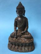 A metalwork model of Buddha