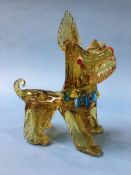 A large model of a Murano dog in amber, with blue collar, 24cm wide and 31cm height