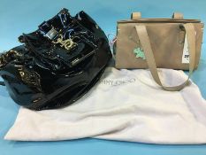A Jimmy Choo hand bag and a Radley handbag