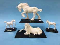 Four white Beswick horses