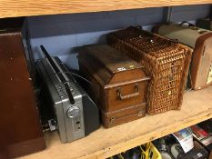 A shelf of radiograms, sewing machine etc.