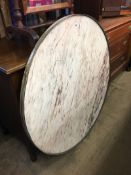 A large circular marble top