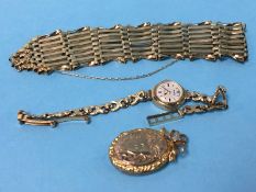 A 9ct gold bracelet, 14.1 grams, a locket and a ladies watch