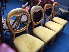 Set of four balloon back chairs