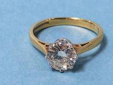 An 18ct gold solitaire diamond ring, stamped 750, ring size L