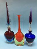 A Murano orange and cased glass vase, with long tapering neck and two cased glass vases with long