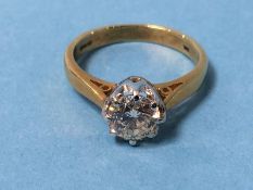 An 18ct gold solitaire diamond ring, stamped 750, ring size K