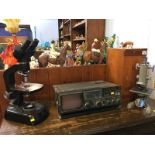 A Beck microscope, a Watson microscope and Bush radio/TV