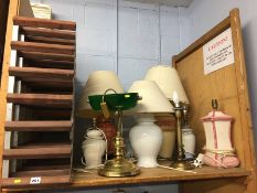 Shelf of assorted lamps etc.