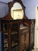 An Edwardian mahogany 'Sheraton' design mirror back display cabinet, 153cm wide