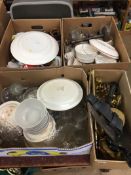 Four boxes of glassware, china, horse brasses and a sewing machine