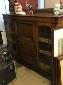 An oak side by side, with leaded glass doors