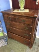 A small oak chest of drawers