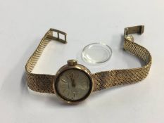 A ladies 9ct gold wristwatch