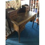 An Edwardian mahogany ladies writing desk