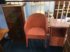 Lloyd Loom bedside cabinet, a basket weave chair and a coffee table