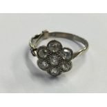 White metal cluster ring