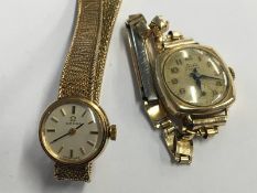 A ladies 9ct gold Omega watch and one other