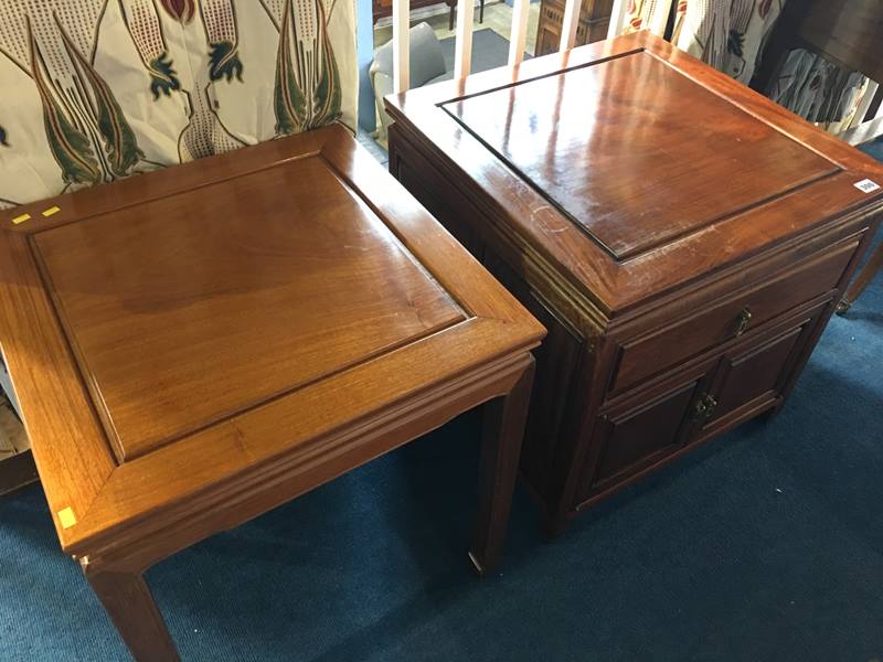 An Oriental cabinet and a small Oriental coffee table