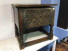 Oak carved stool with rising top