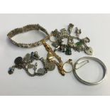 Bag of assorted jewellery, including a silver charm bracelet