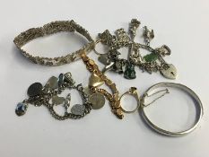 Bag of assorted jewellery, including a silver charm bracelet