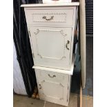 Two cream bedside cabinets