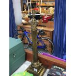 A brass Corinthian column table lamp