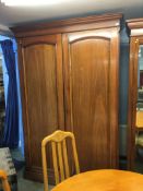 A late 19th century mahogany double door wardrobe