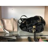 Jimmy Choo handbag and one other