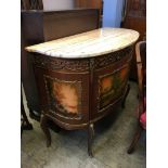 A Louis XV style marble top side cabinet