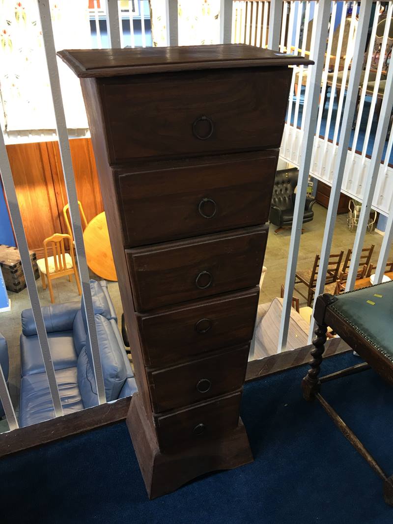 A tapering chest of six drawers