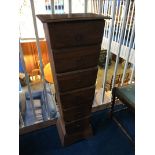 A tapering chest of six drawers