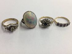 Two 9ct rings and two others
