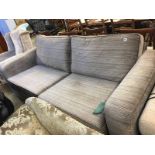 A Delcor three seater settee (as new)