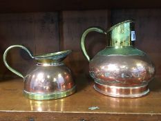 Two copper and brass jugs