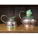 Two copper and brass jugs