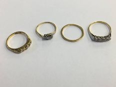 Four 18ct gold rings, 9.4g total weight