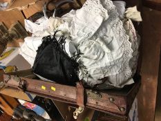 Assorted linen in a leather suitcase