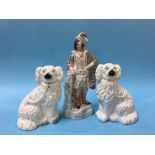 A Staffordshire figure of 'Bruce' and a pair of spaniels