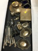 Assorted silver, to include a Capstan inkwell, various napkin rings etc.