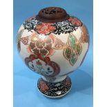 A Japanese Satsuma ware vase of onion shape, decorated with stylised panels and exotic birds, signed