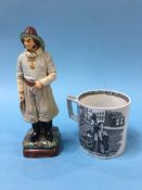 A Wayte and Ridge pottery figure of a fisherman, numbered 135 and a 19th century tankard, 'How's