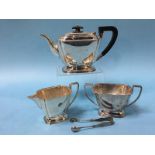A silver three piece tea service, Atkin Brothers, Sheffield 1940, together with a pair of sugar