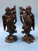 Two Oriental hardwood carved 'Rootmen' figures