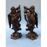 Two Oriental hardwood carved 'Rootmen' figures